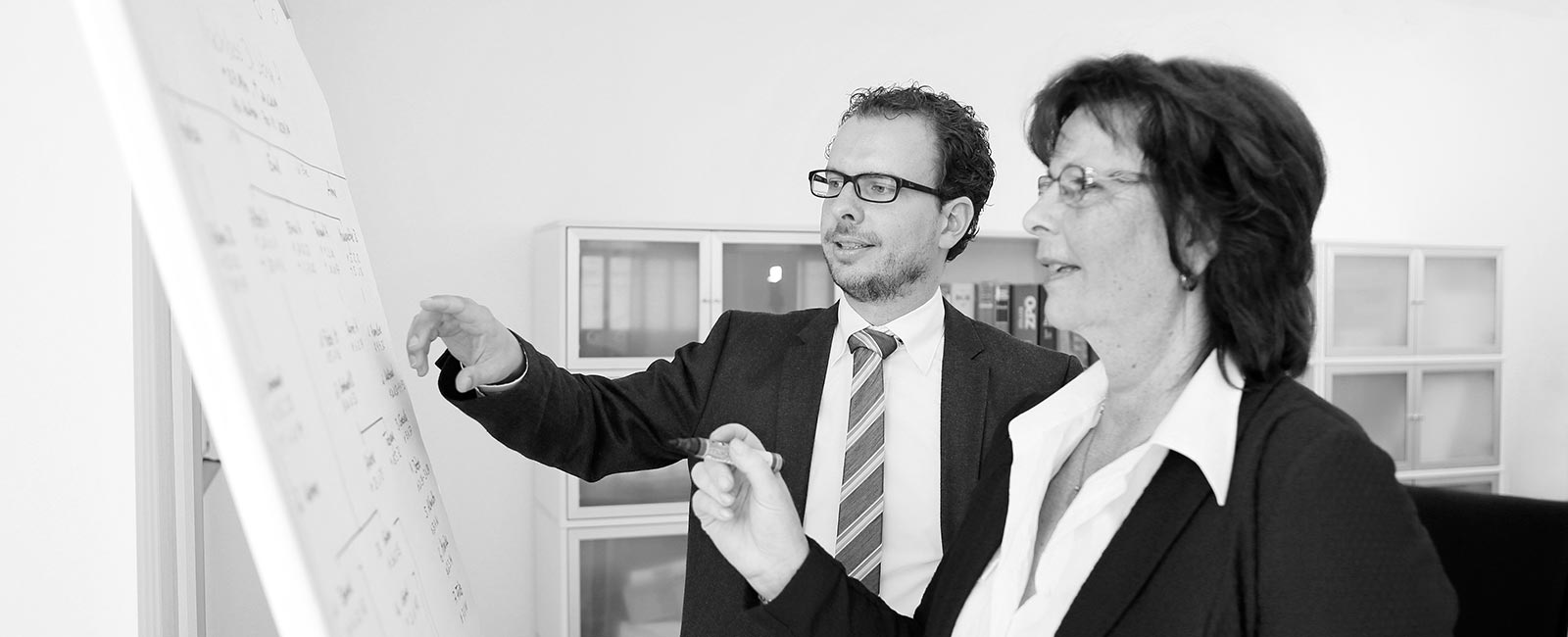 Dr. Rene Guelpen und Mitarbeiterin